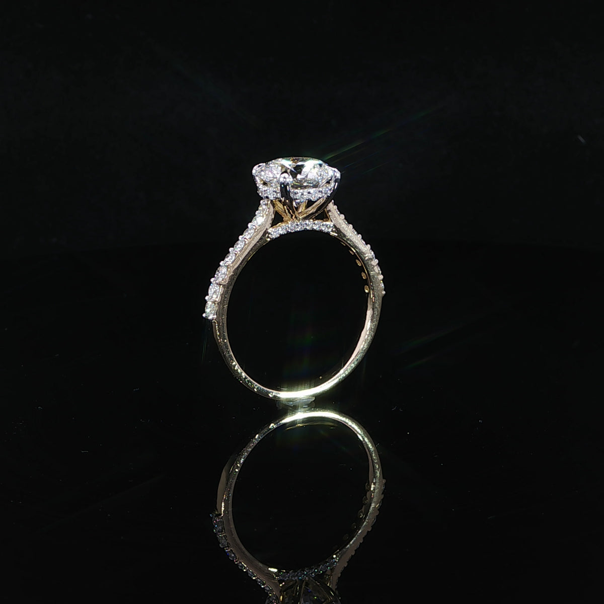 Yellow gold engagement ring with 2.41 total carats of lab-grown diamonds.
