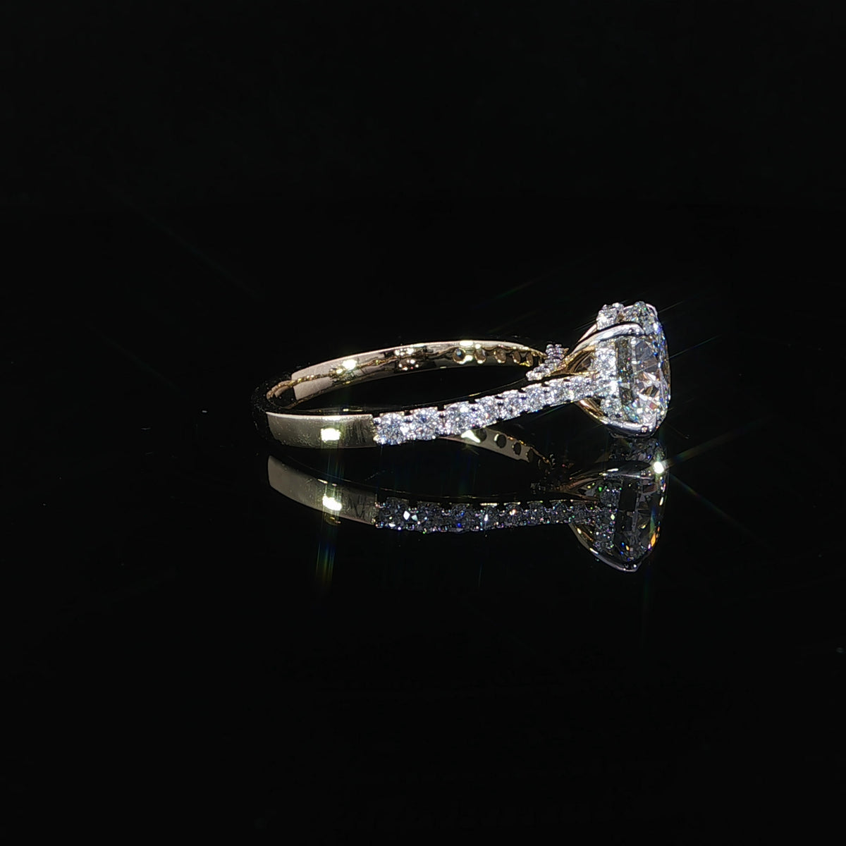 2-carat round lab-grown diamond engagement ring with a cathedral setting in 14K yellow gold.