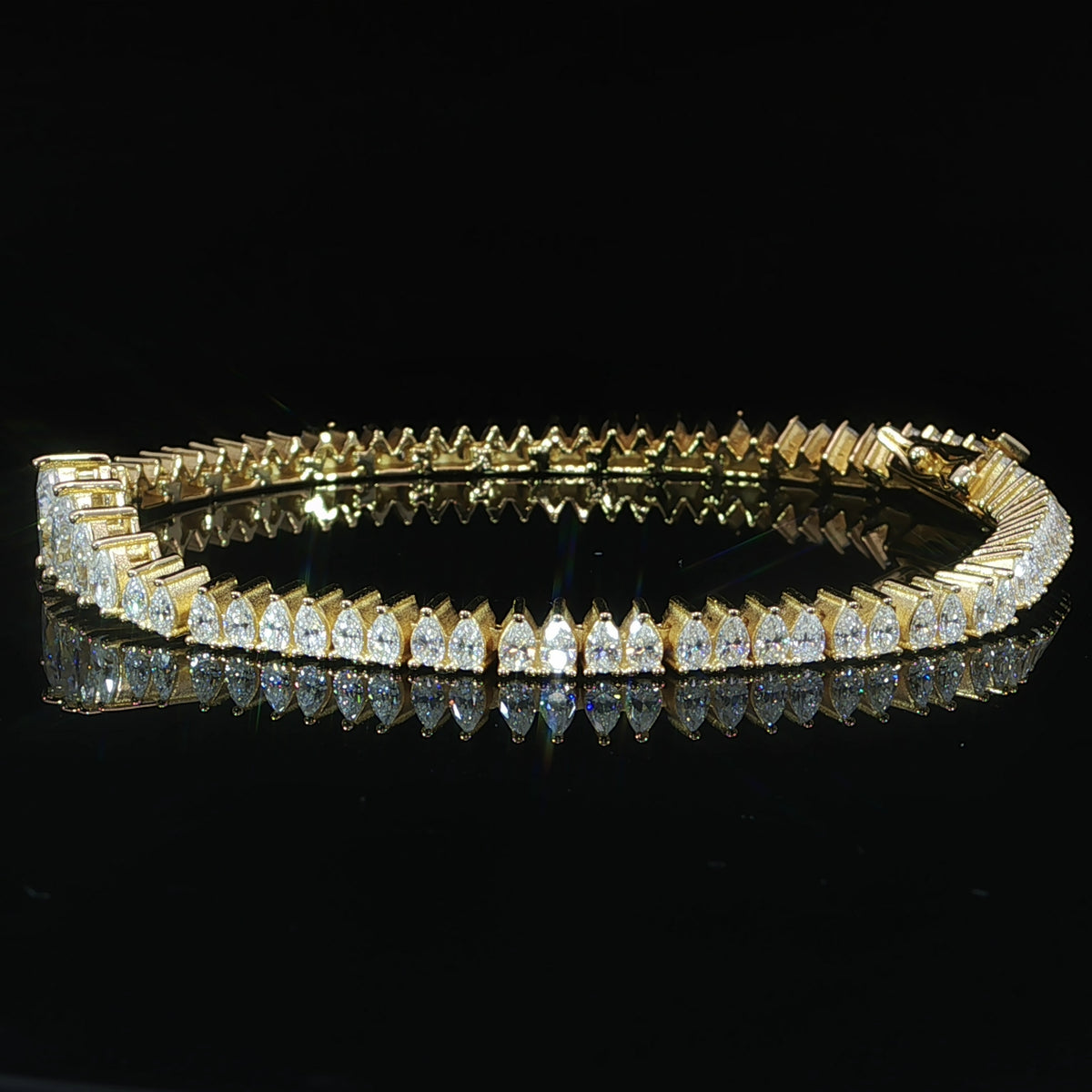 Graduated pear moissanite tennis bracelet featuring 8.78 CTW