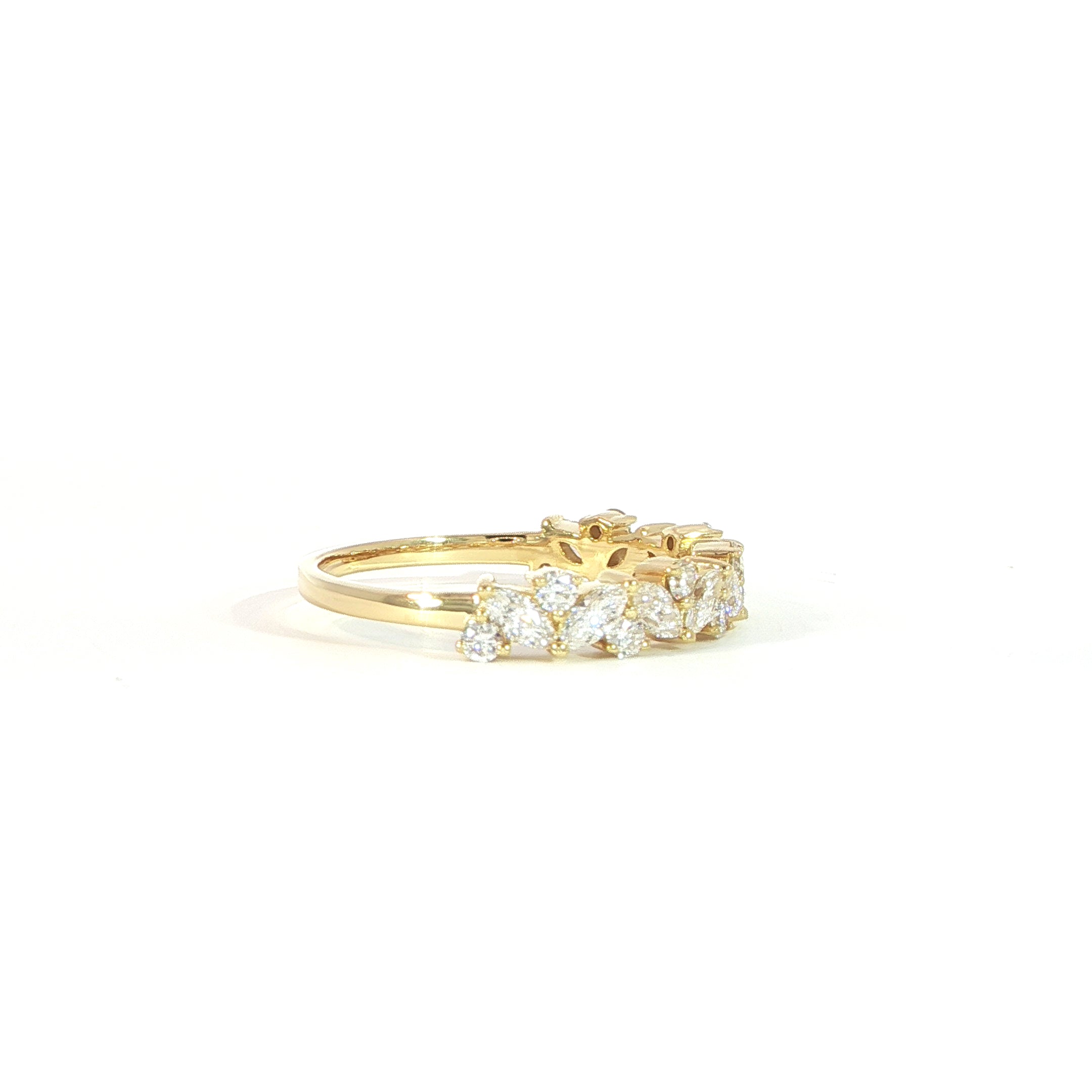 Side view alternating marquise and round diamond wedding band