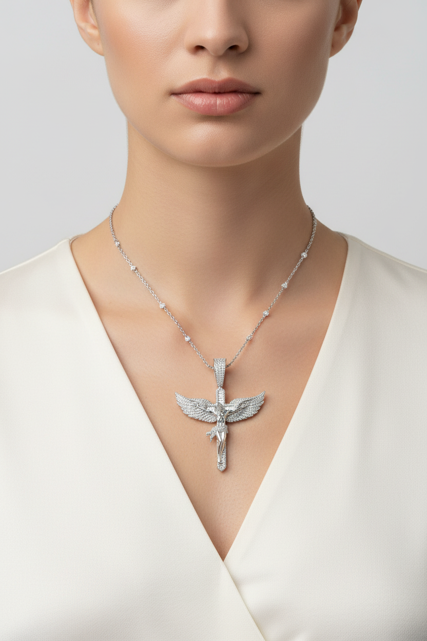 Jesus crucifix wing pendant with round and baguette moissanite stones on model.