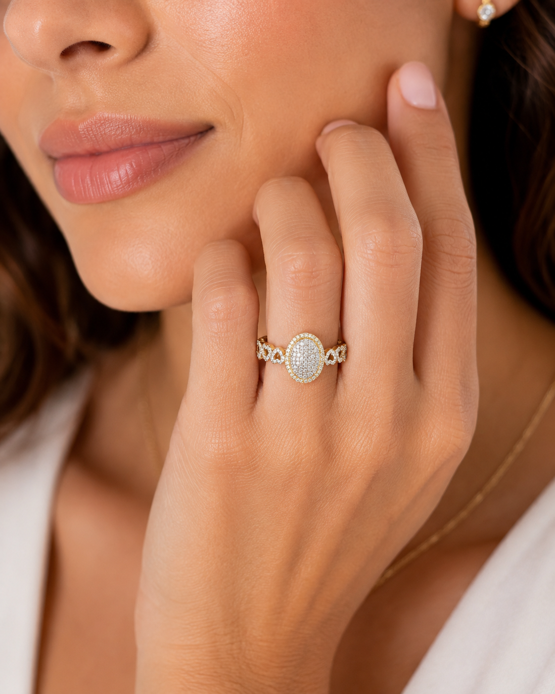 Natural diamond oval cluster cocktail ring with diamond-accented heart links