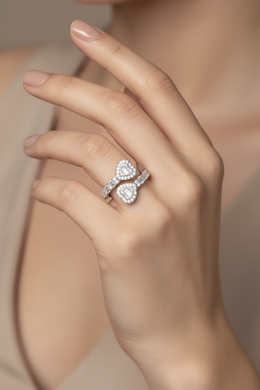 Model wearing silver double heart ring with VVS moissanite stones