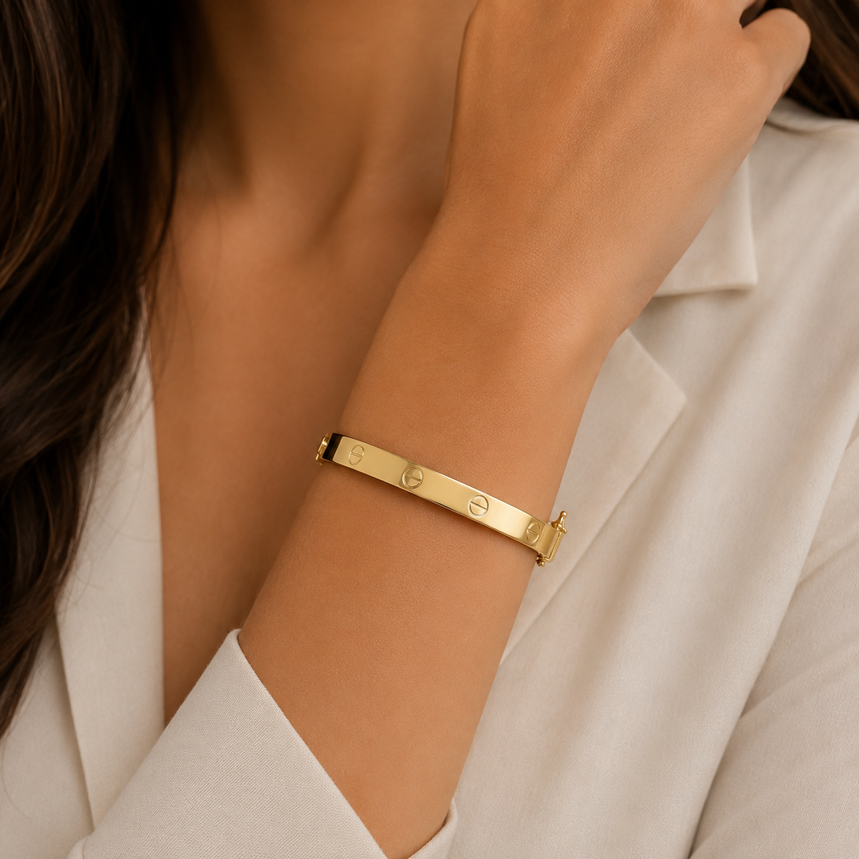 14K yellow gold screw motif bangle bracelet with polished finish
