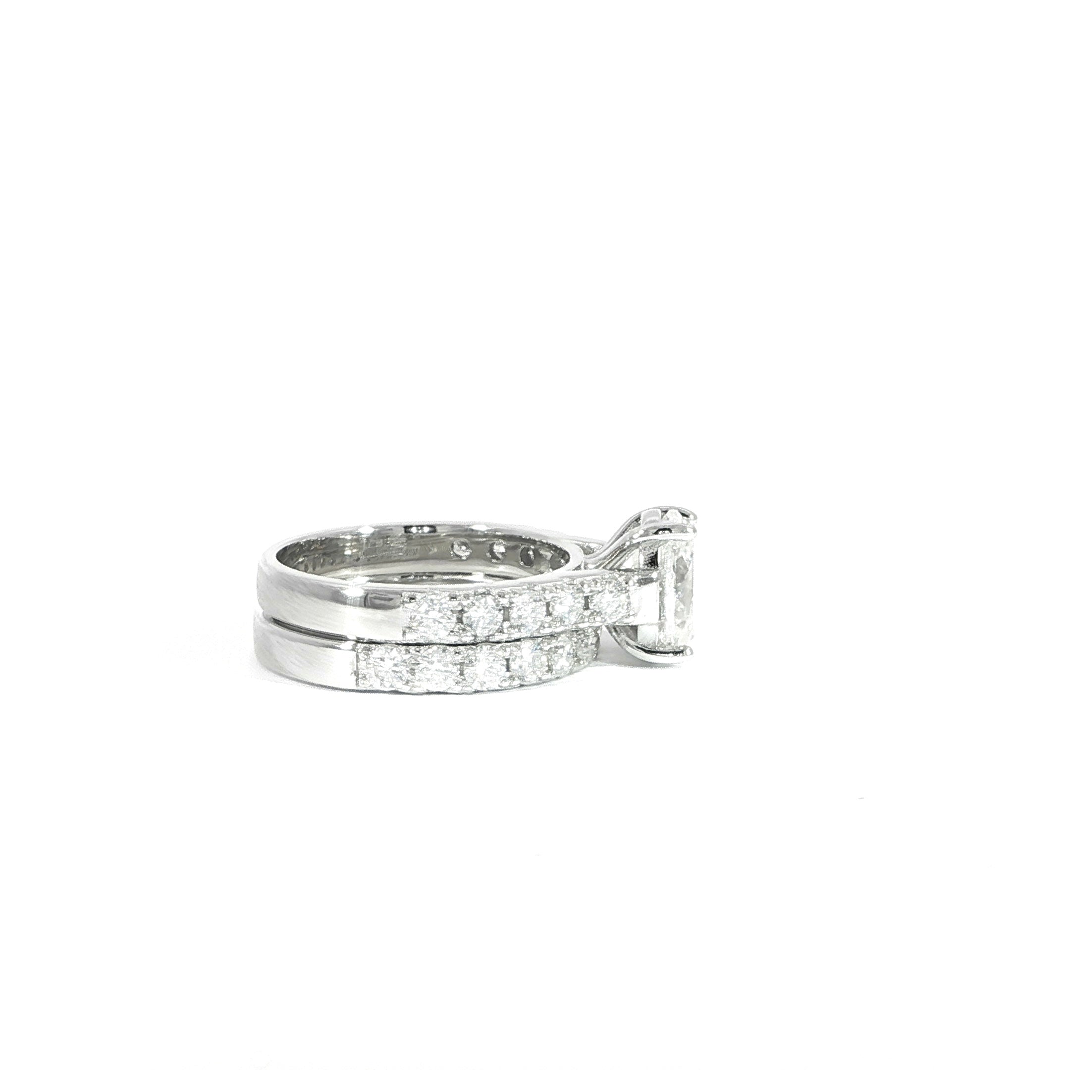 Side view silver VVS moissanite bridal set with matching band
