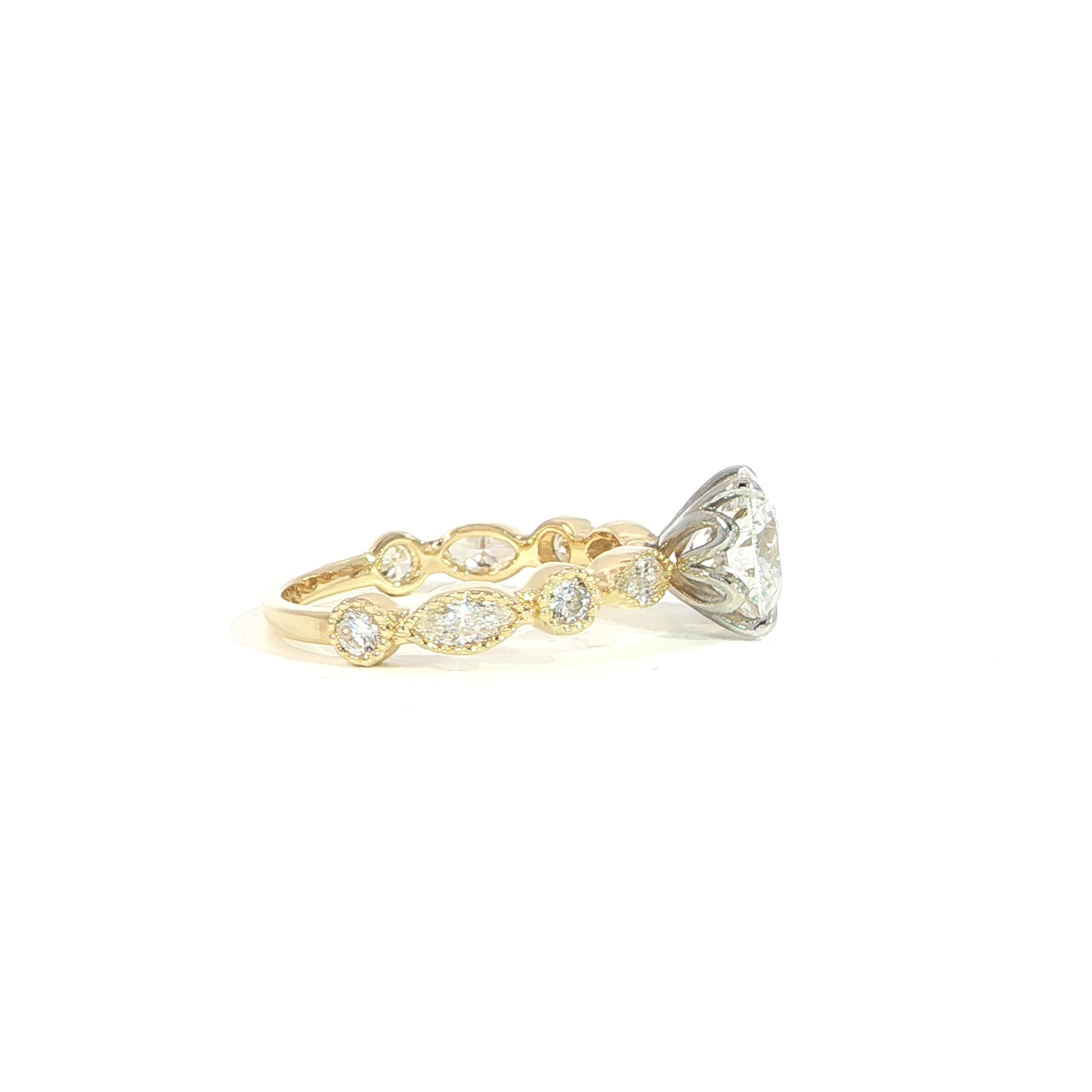 Vintage lab grown diamond engagement ring with bezel band side view