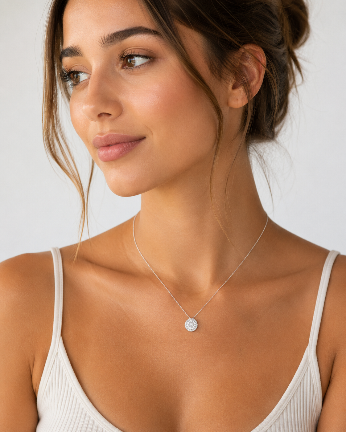 Sunburst-inspired moissanite pendant on a cable chain.
