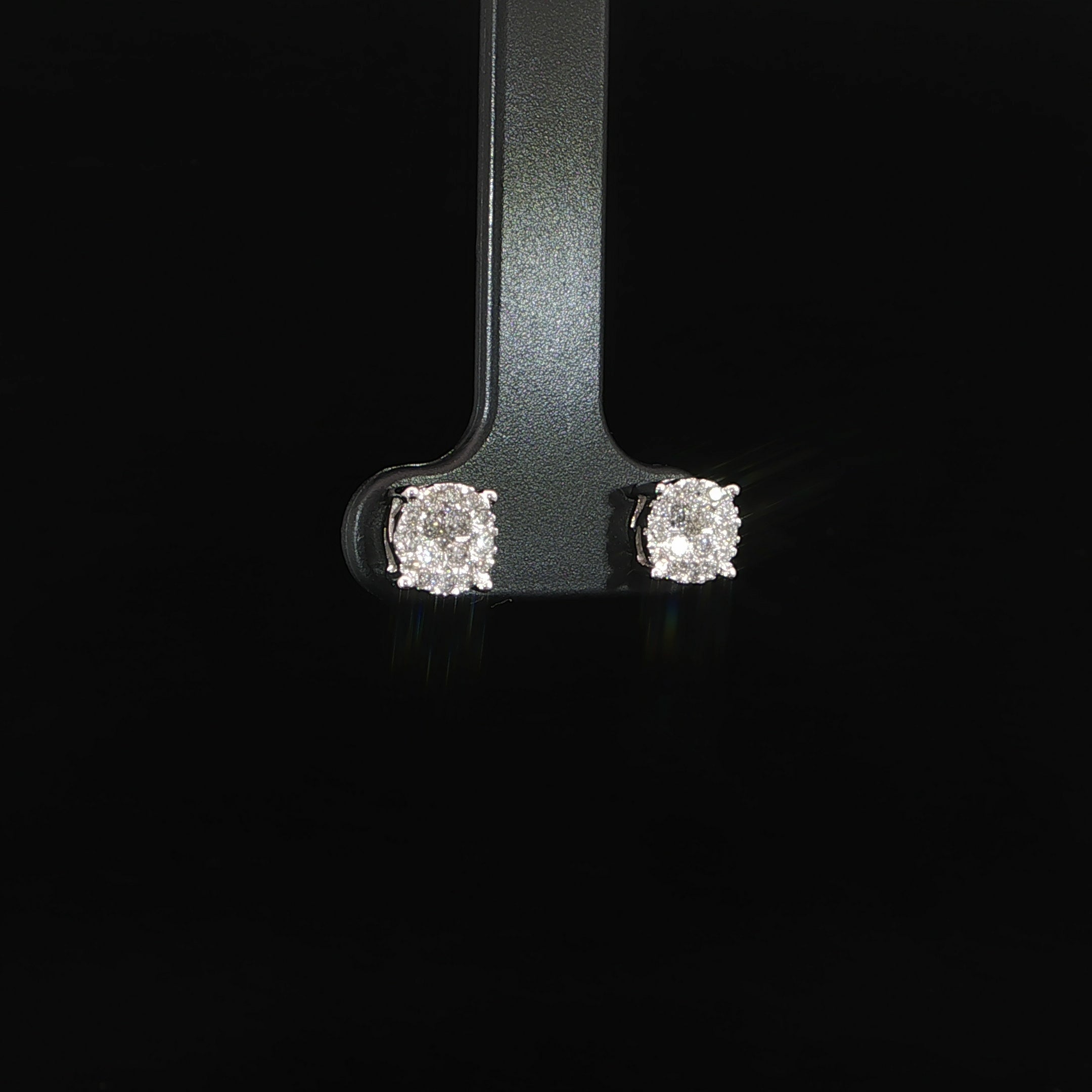 Angle view 0.37 CTW natural diamond stud earrings crafted in white gold