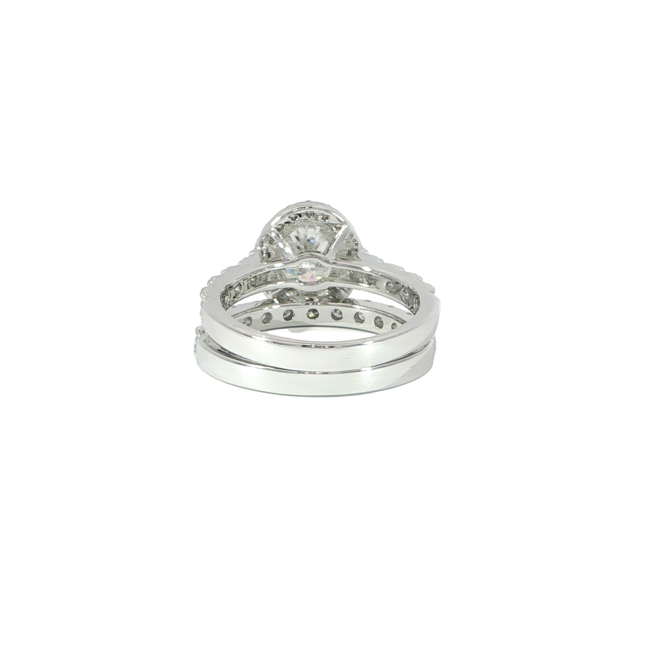Luxury-inspired oval halo engagement ring with matching band