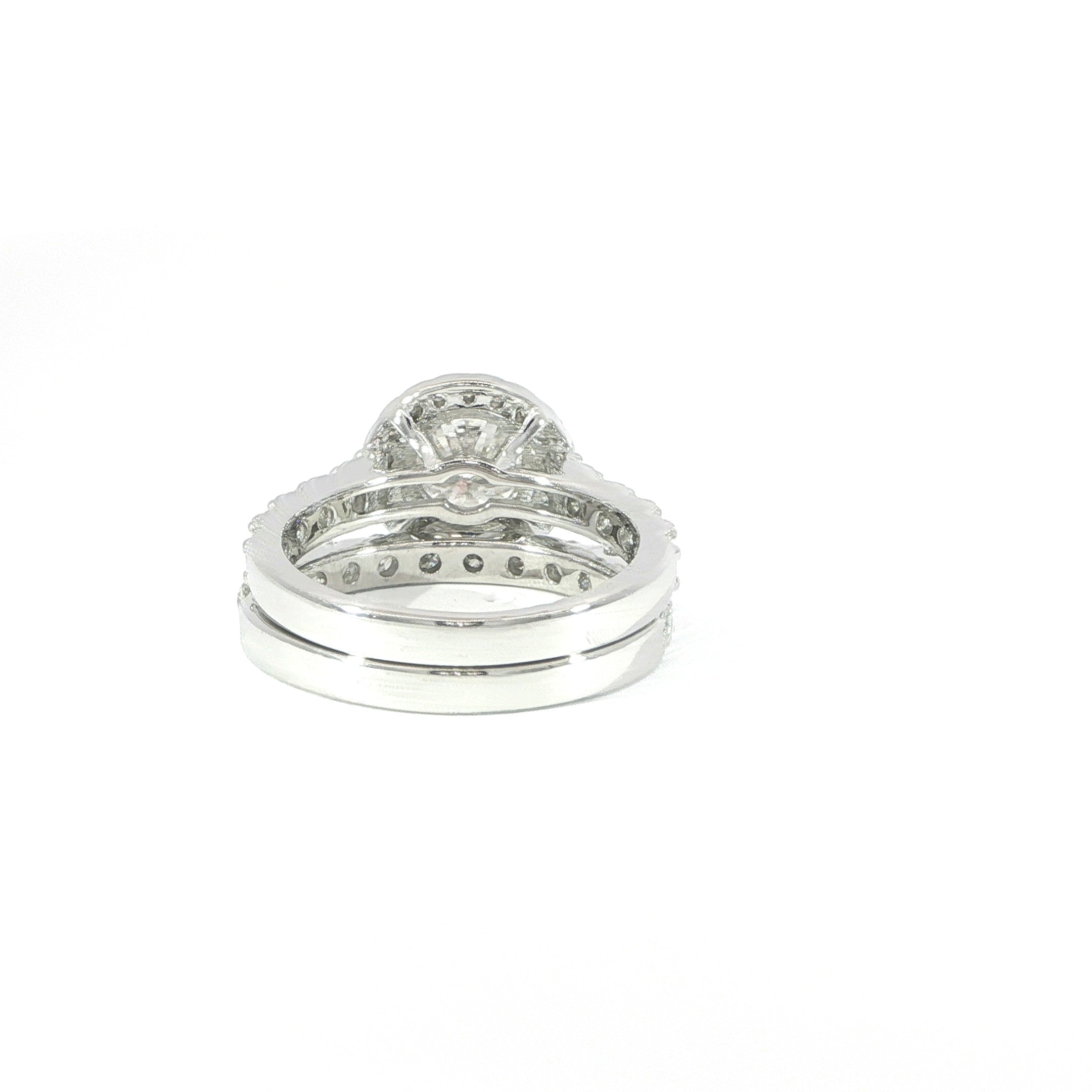Sparkling sterling silver bridal set with round halo moissanite center stone