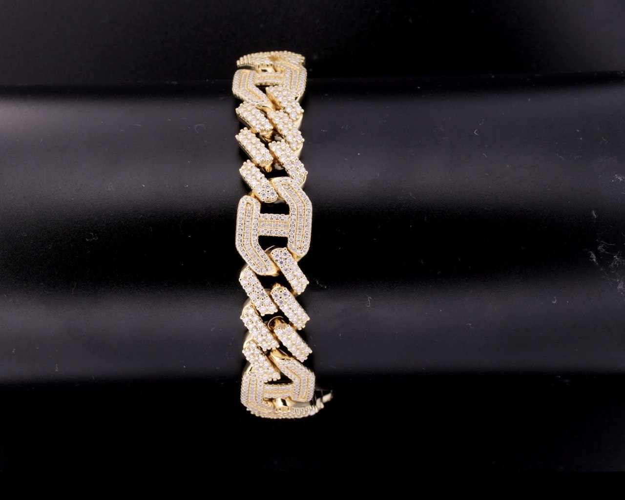 Luxury iced out Cuban link bracelet crafted in sterling silver with radiant VVS moissanite stones