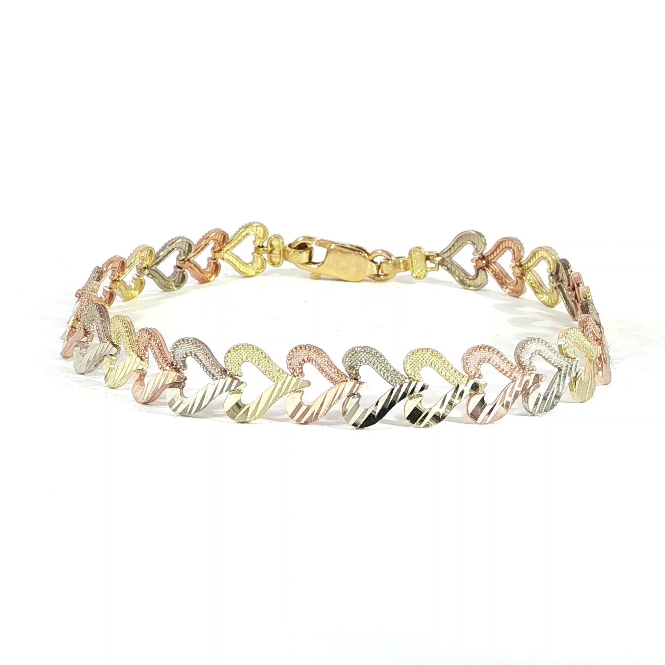 10K tri-color gold diamond-cut heart pattern bracelet.