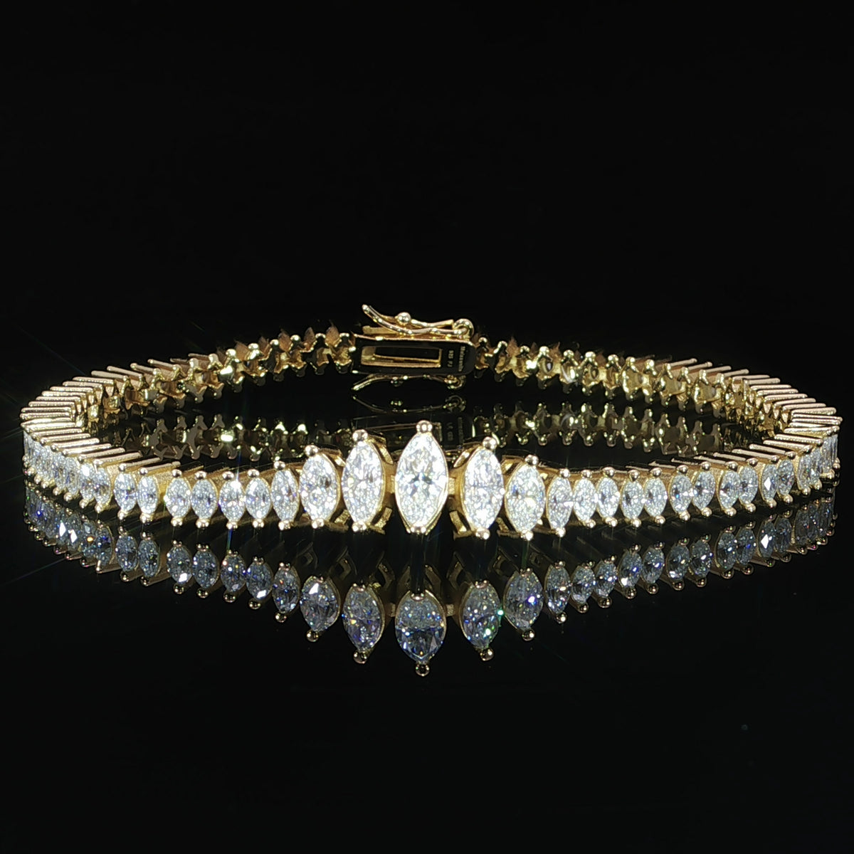 Close-up of VVS marquise-cut moissanite stones in a graduated bracelet