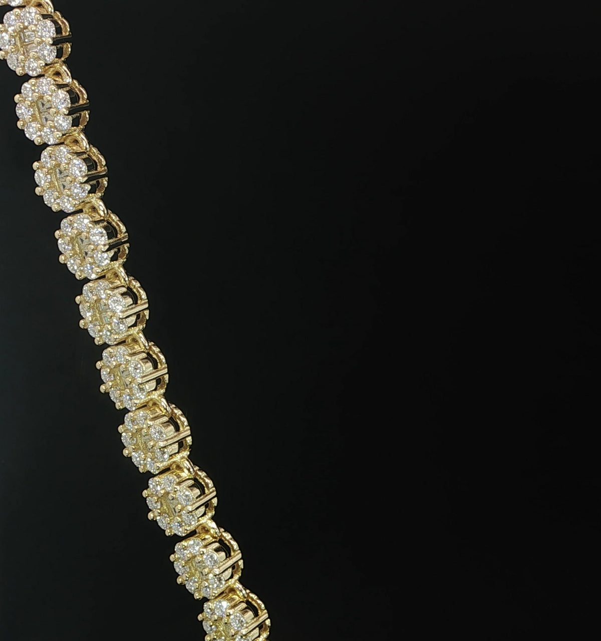 Close-up of VVS moissanite flower clusters on a tennis chain
