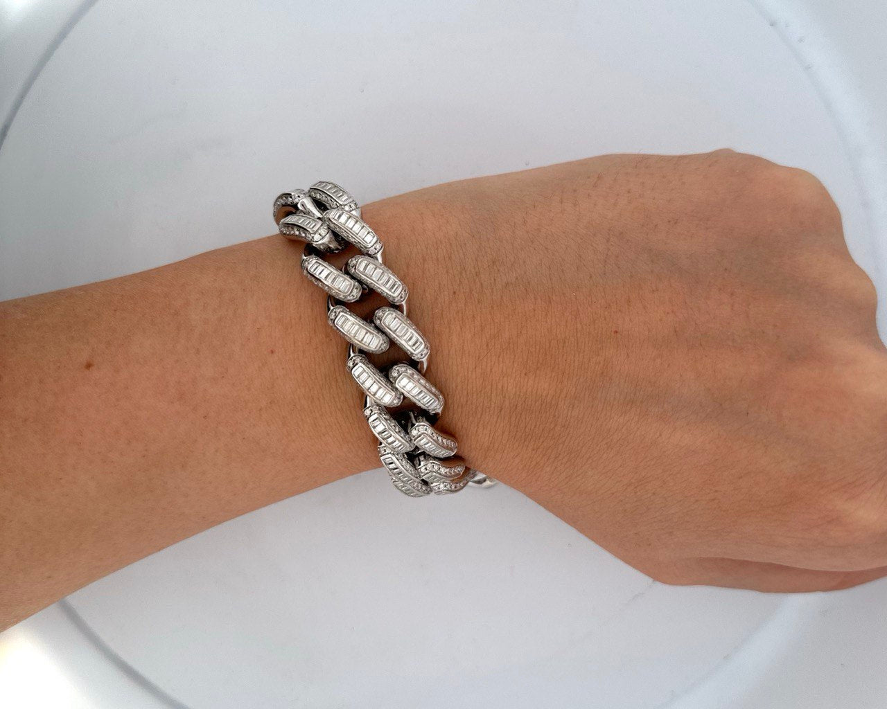 VVS moissanite Miami Cuban bracelet featuring baguette-cut center accents.