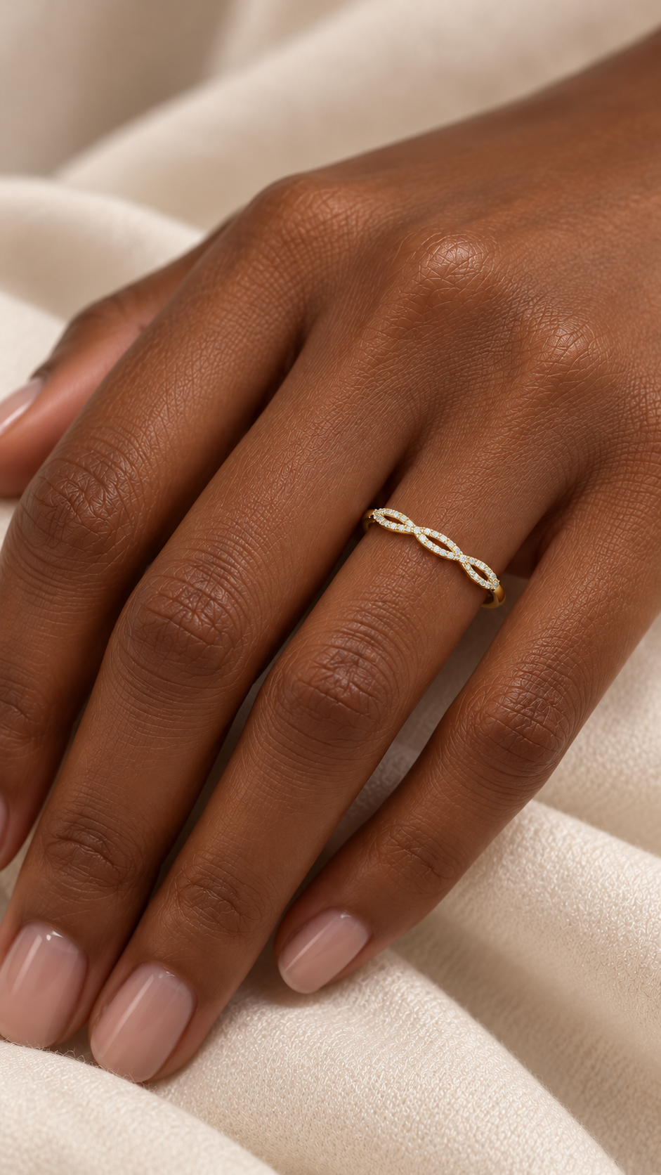 14K yellow gold intertwined diamond band featuring 0.23 CTW D–F color, VS–VVS clarity lab grown diamonds in a delicate overlapping pattern.