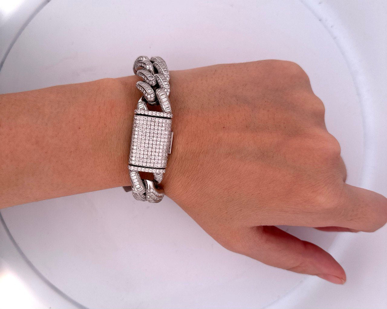 Iced out 925 silver Miami Cuban bracelet with baguette links.