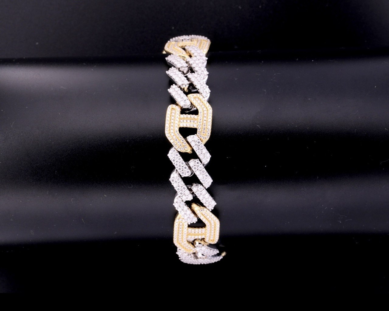 Designer inspired geometric Cuban bracelet featuring 12.14 carats total weight of VVS moissanite