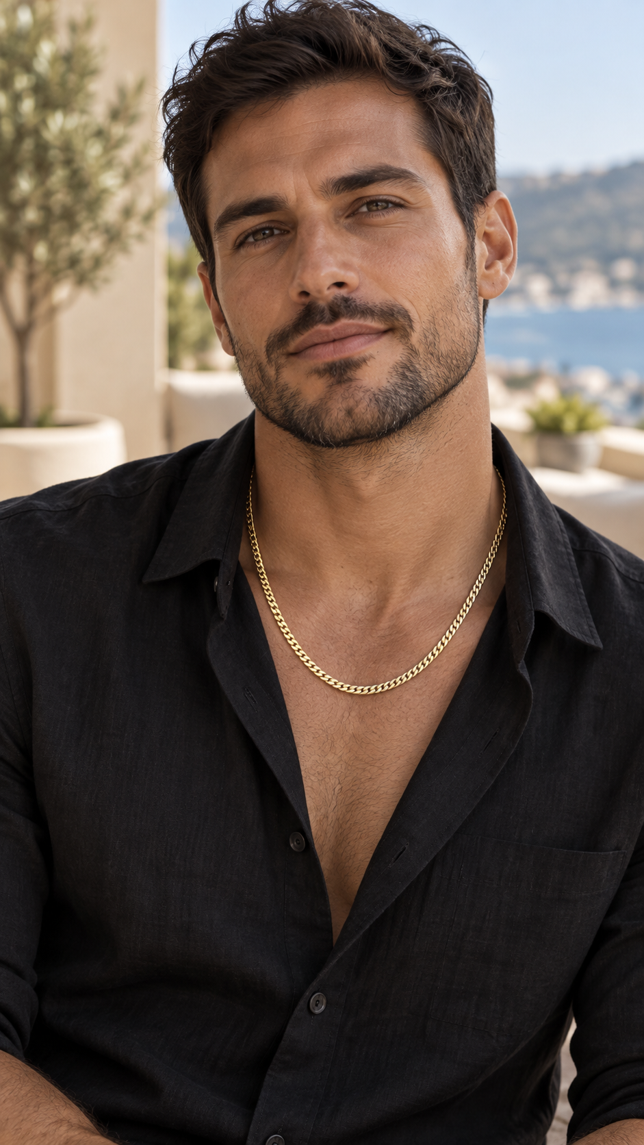 Male model wearing a 14K yellow gold solid Miami Cuban chain