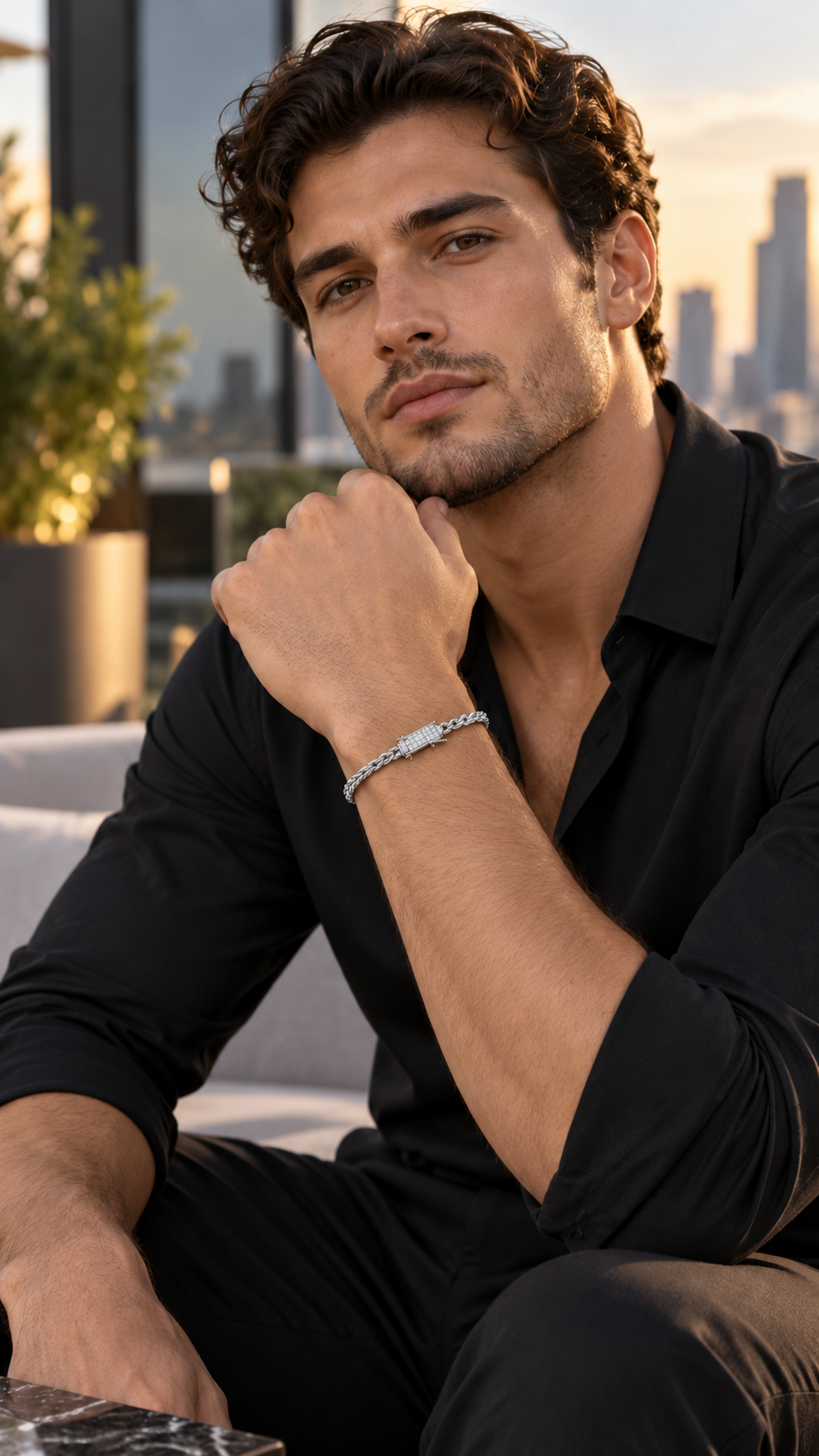 Model wearing a 4 mm solid sterling silver rope bracelet with a moissanite clasp