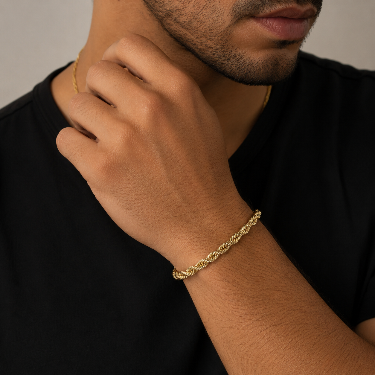 10K yellow gold diamond-cut rope bracelet measuring 5MM wide