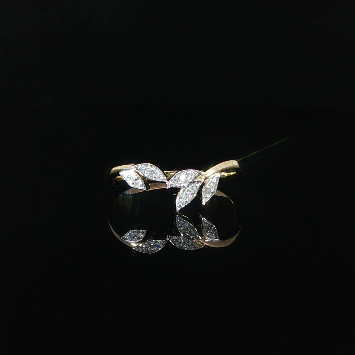 Elegant 14K yellow gold ring featuring marquise-shaped leaf motifs with sparkling lab grown diamond accents in a graceful curved setting.
