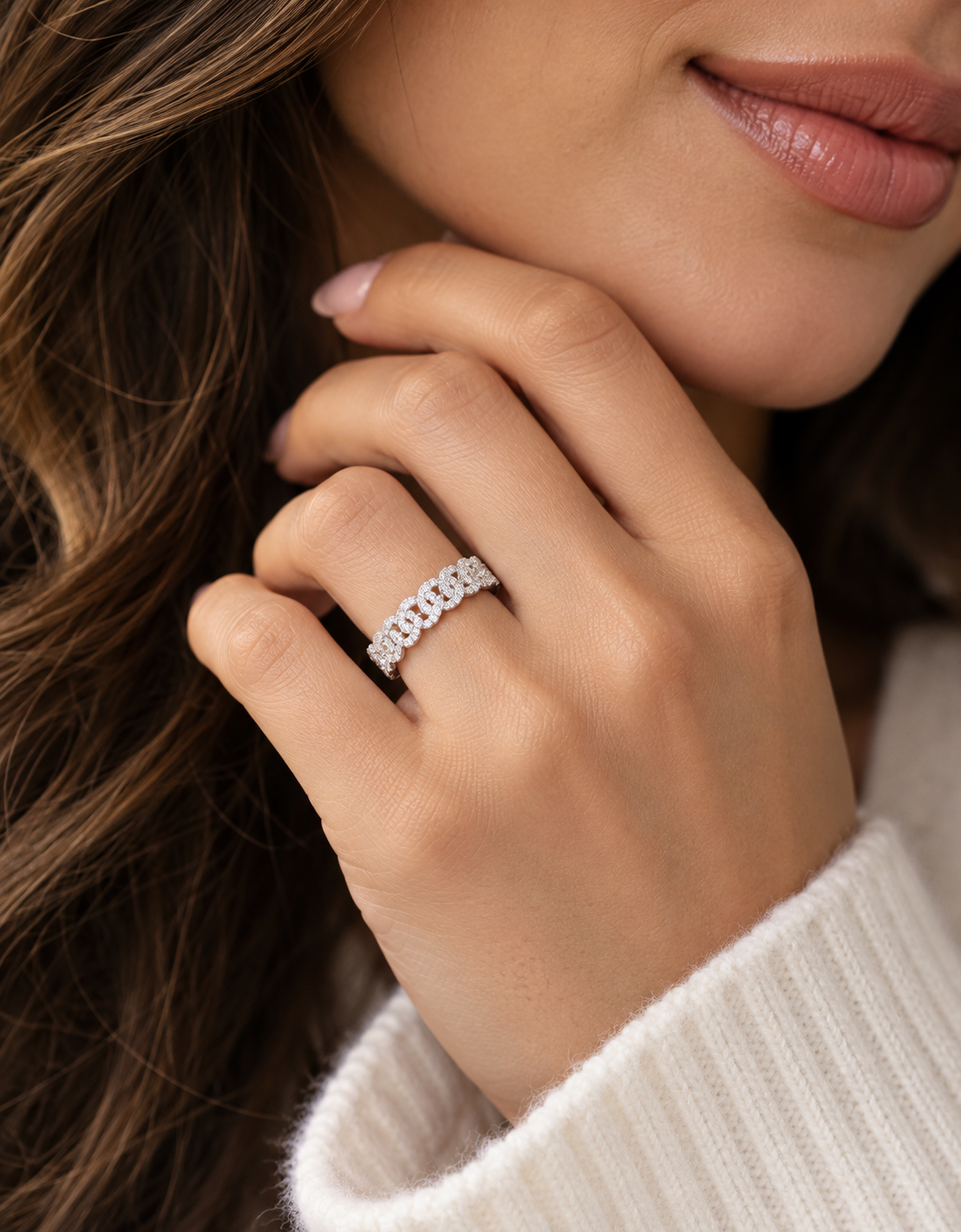 14K white gold band showing pavé diamond links with open centers.