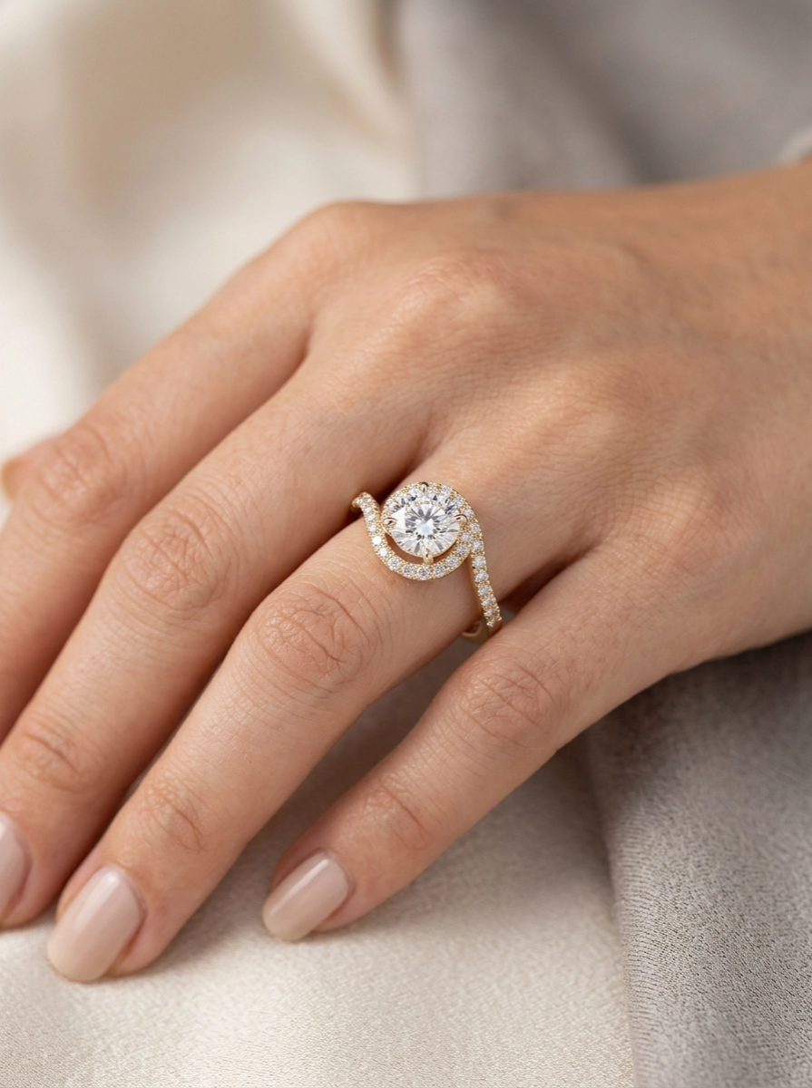 Model wearing bypass ring with round diamond center and curved band