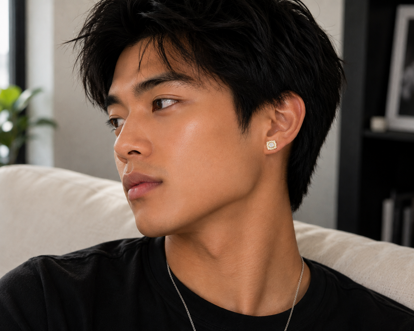 Model wearing 10K yellow gold natural diamond cushion cluster stud earrings