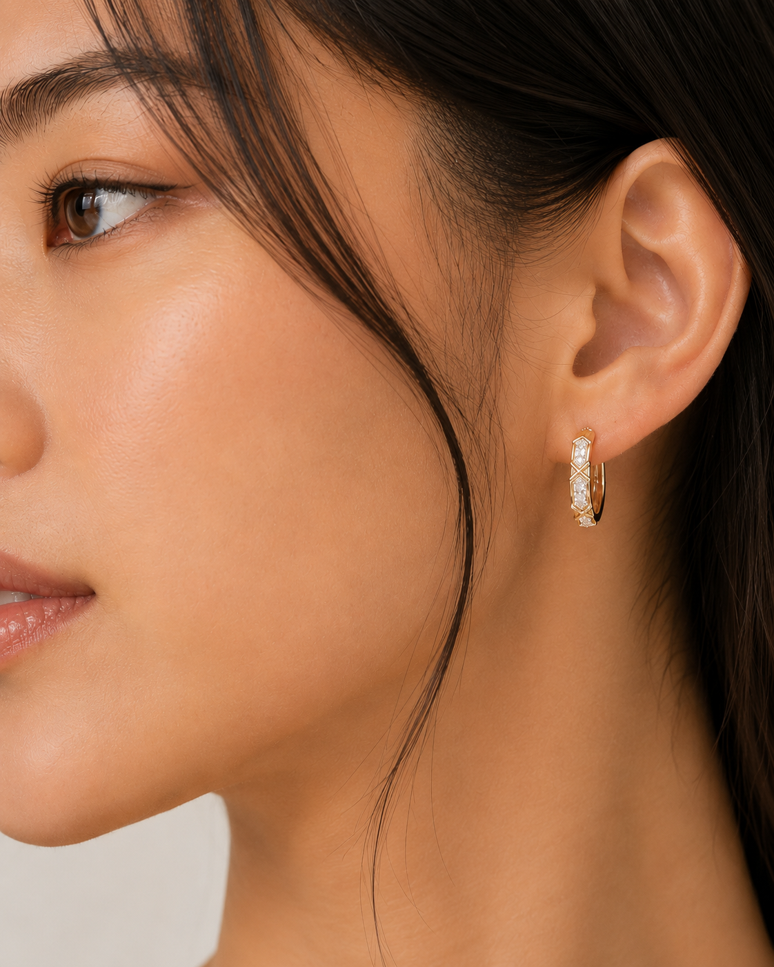 Natural diamond huggie hoop earrings featuring 0.10 CTW