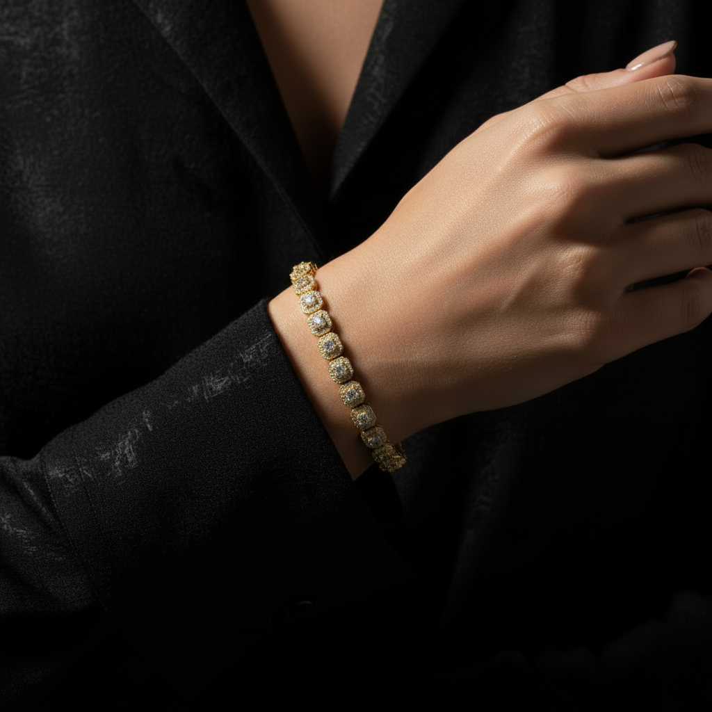 Gold plated silver halo tennis bracelet showcasing brilliant VVS moissanite stones.