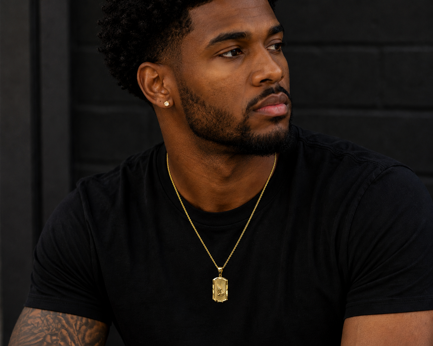Model Wearing Sunburst Praying Hands Pendant in 14K Gold