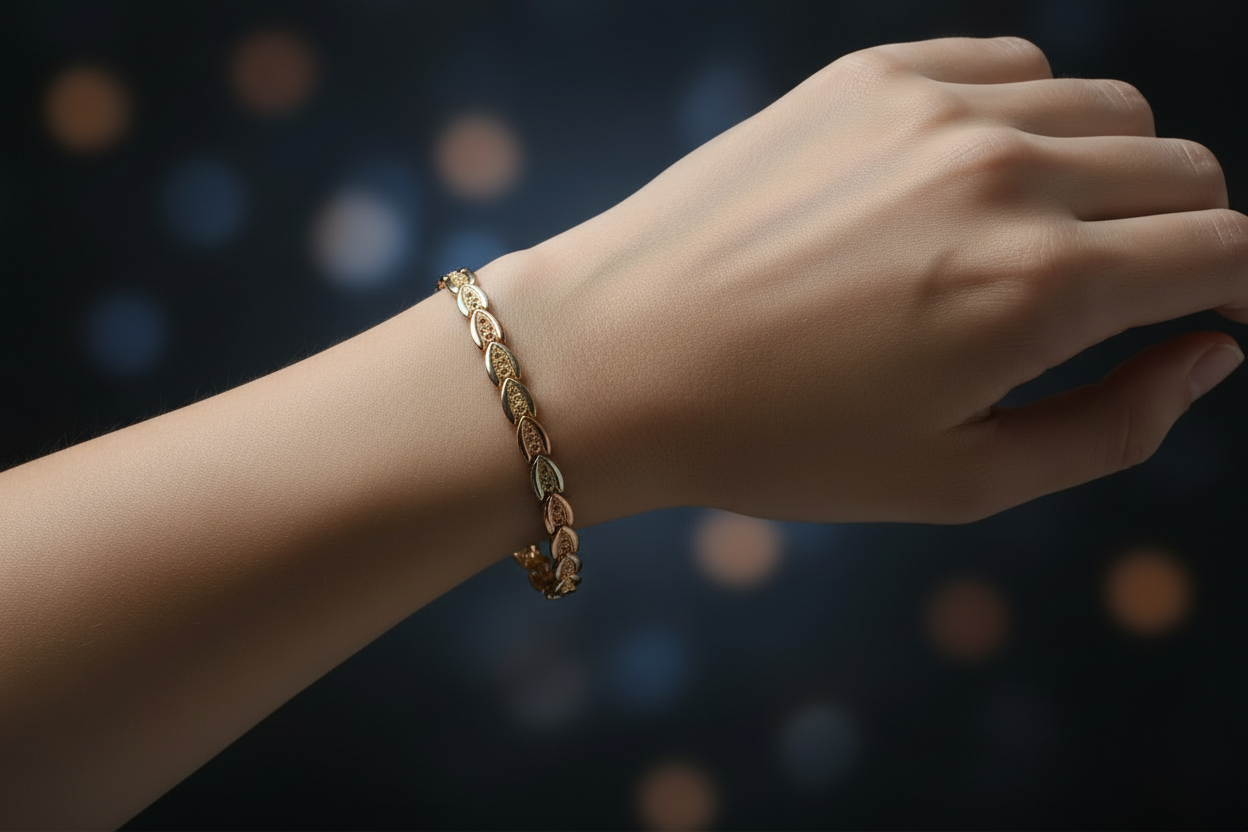 Women's 14K gold filigree leaf bracelet featuring tri-color fancy links