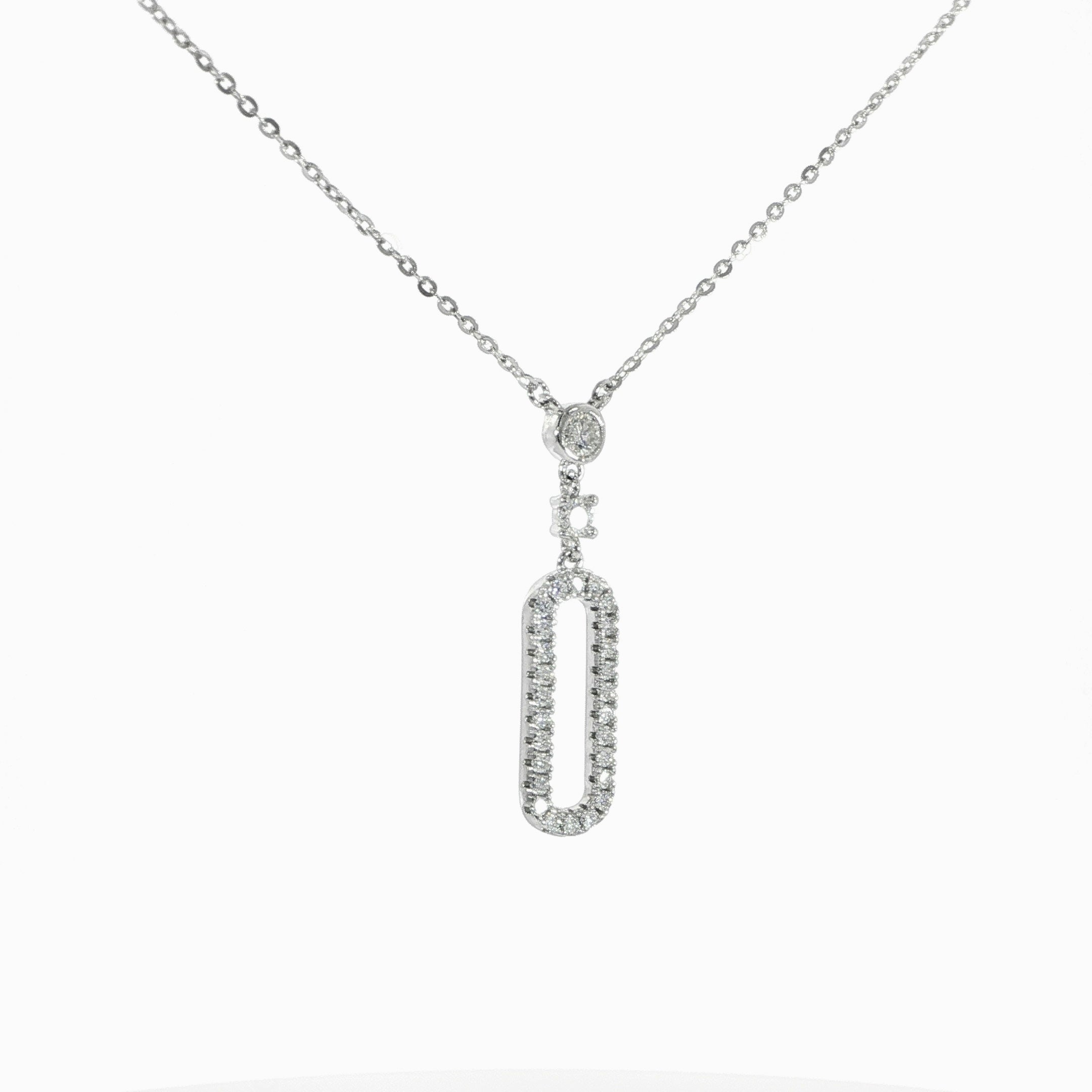 Elegant sterling silver necklace with paperclip-inspired design.