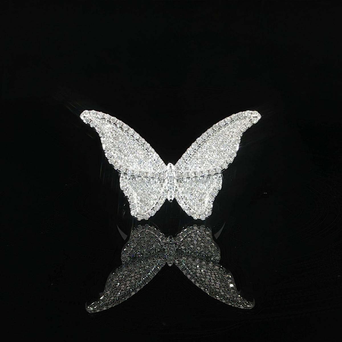 Front view of an open-winged butterfly ring featuring detailed upper and lower wings.