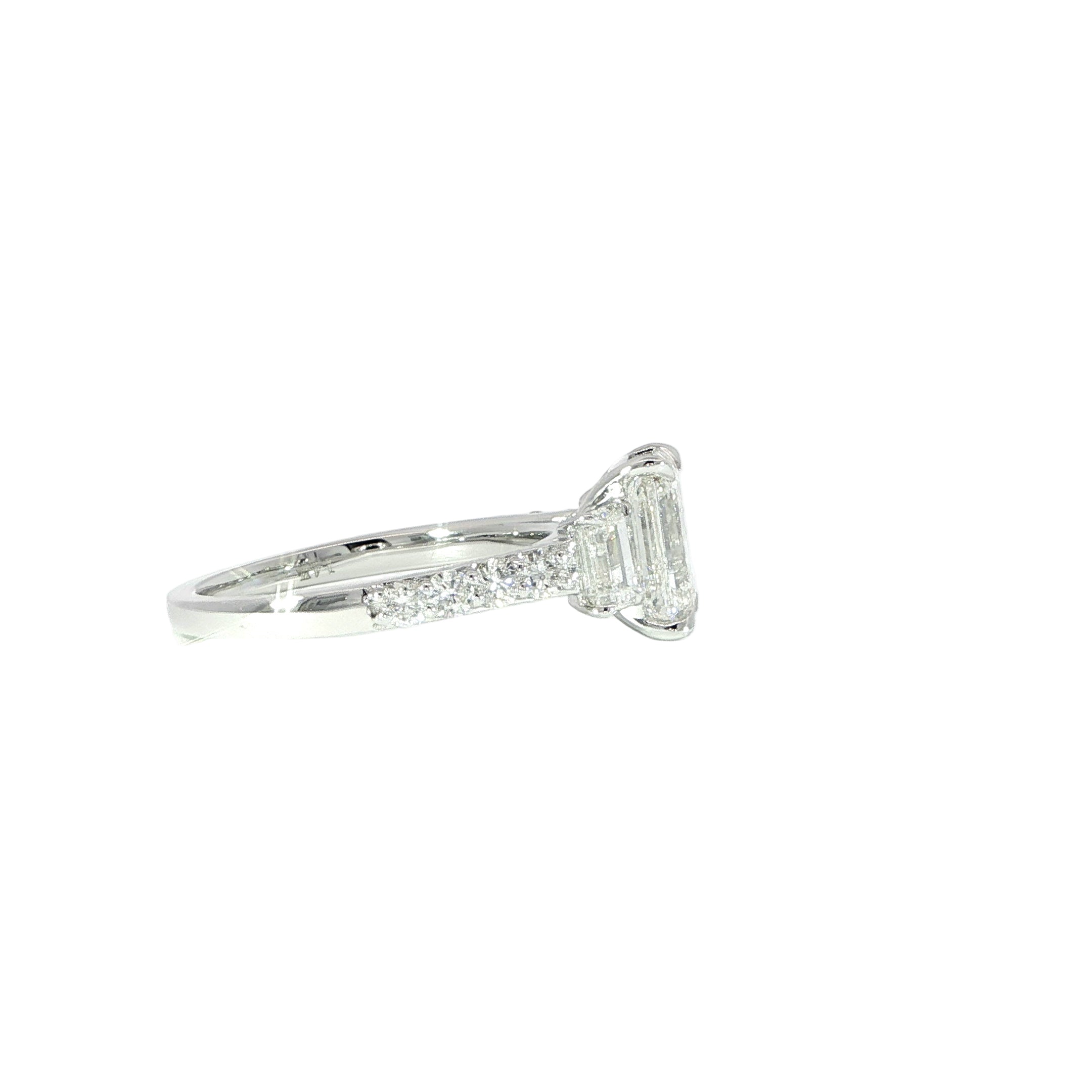 Lab grown emerald cut diamond ring totaling 3.10 carats side