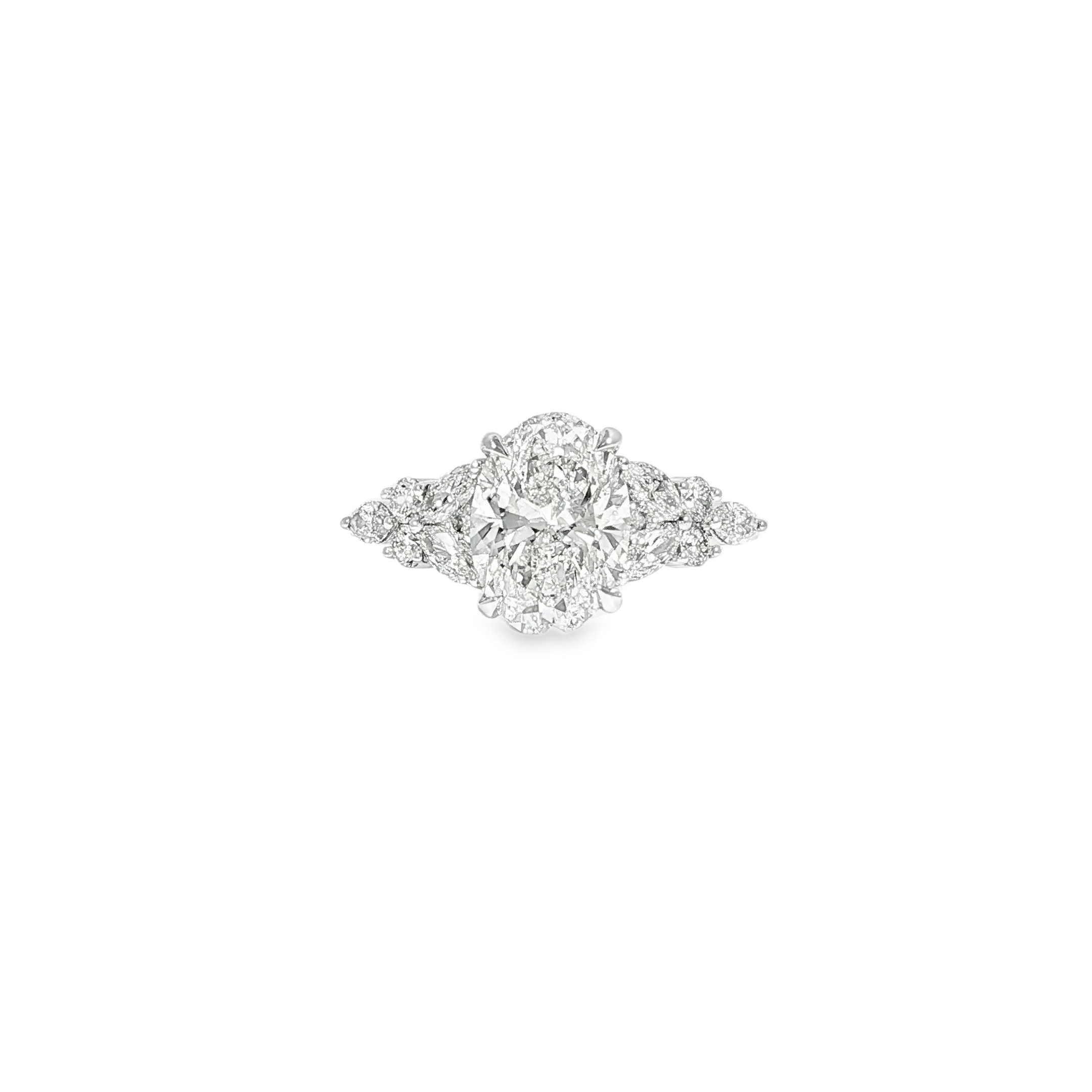 Close up video of oval engagement ring with side accents