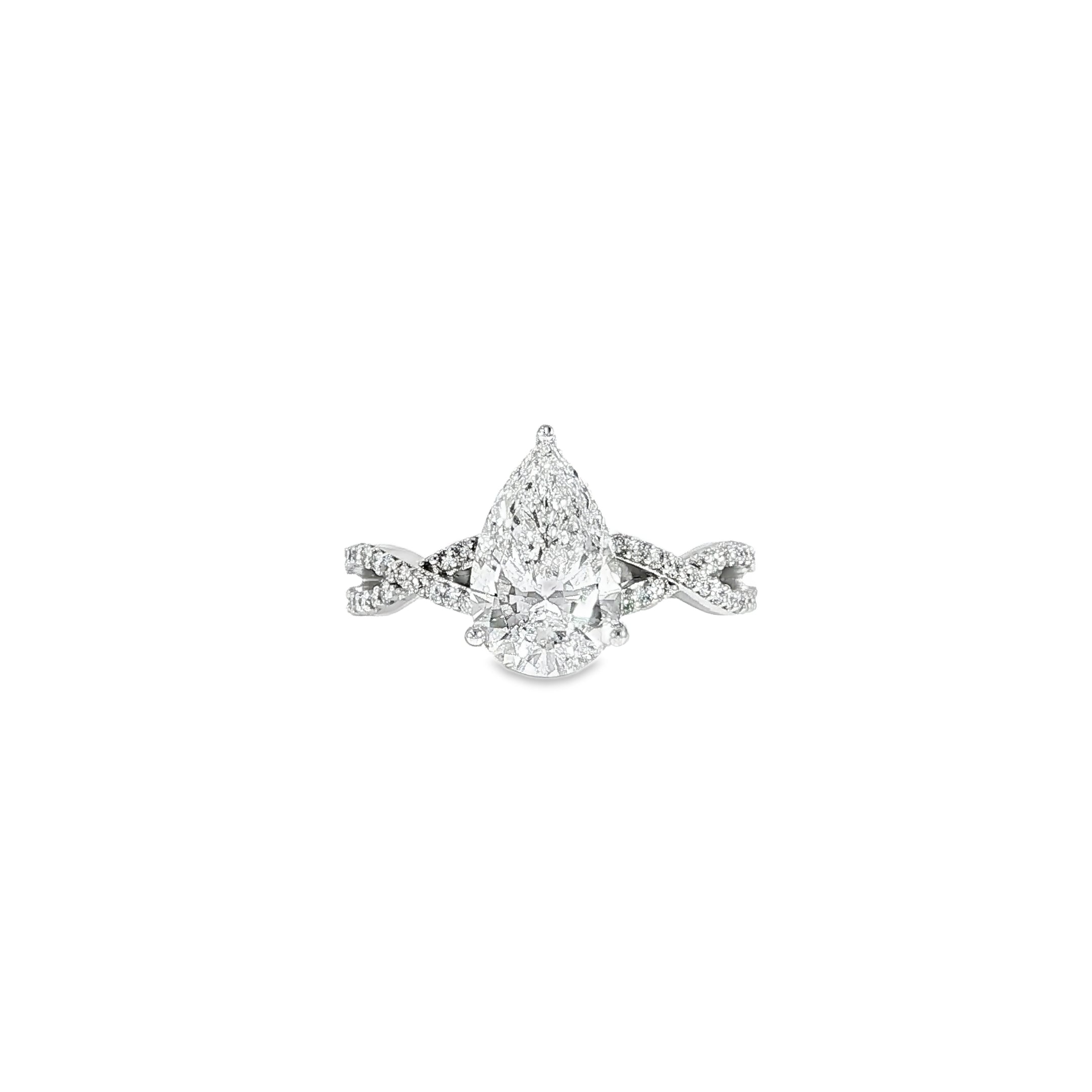 Video showcasing elegant pear diamond ring with hidden halo and twist band in 14K white gold