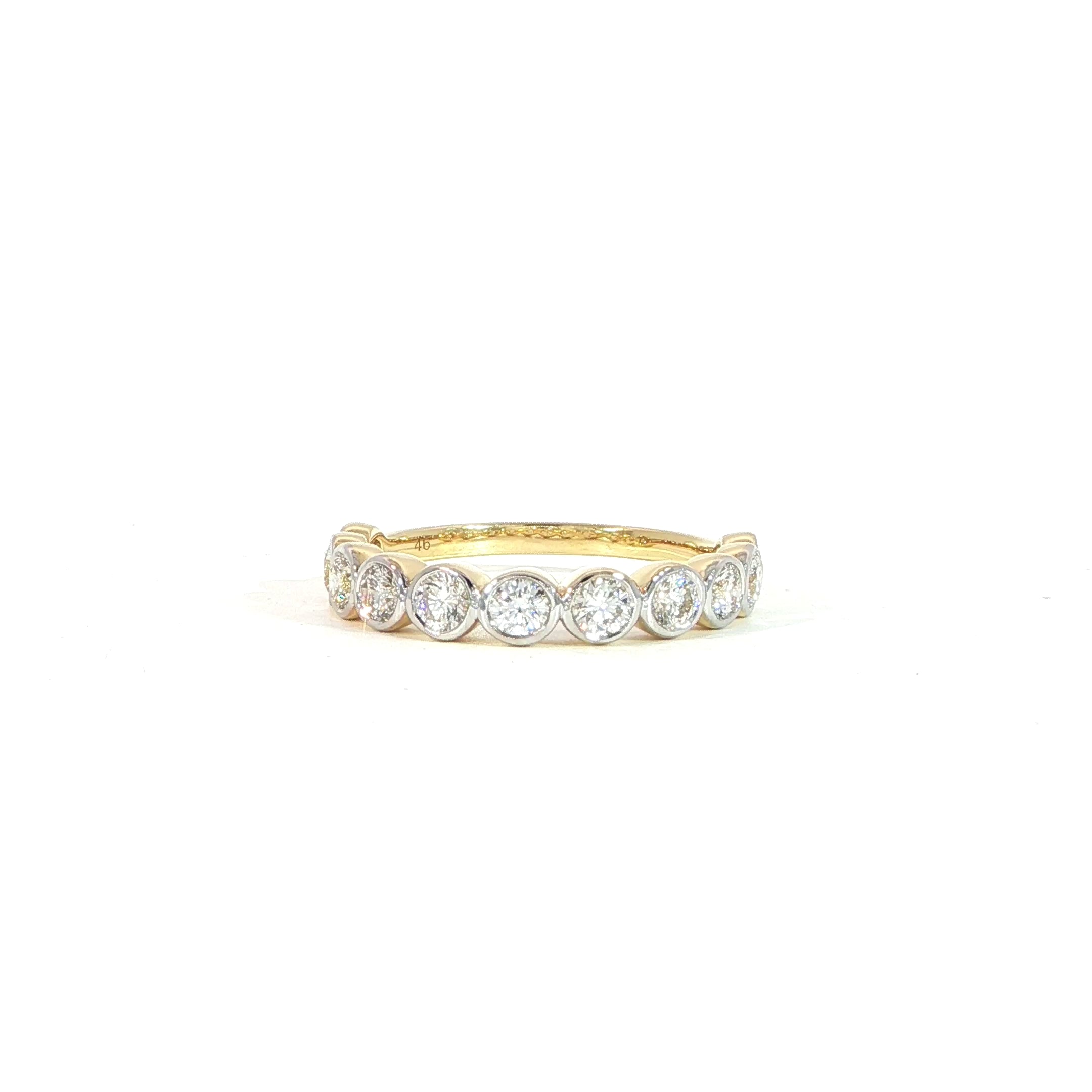 Detailed video of round bezel diamond ring band in 14K yellow gold