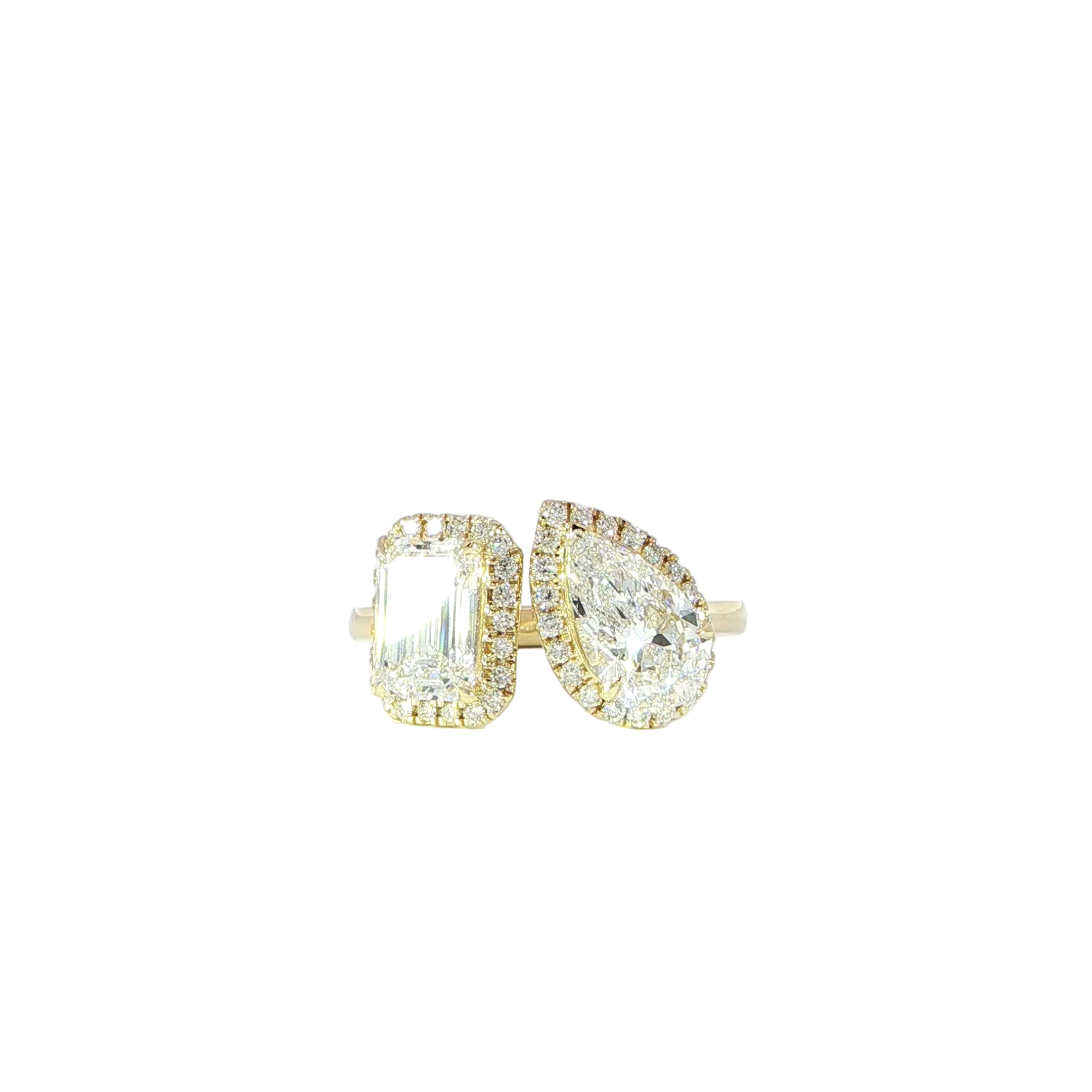 Video of Toi et Moi diamond ring featuring emerald and pear cuts