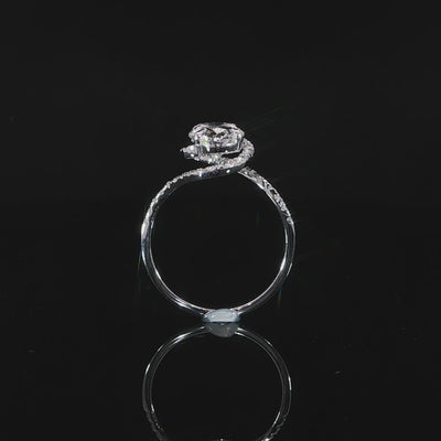 Detailed video of the diamond halo encasing the 2.03-carat oval center stone.