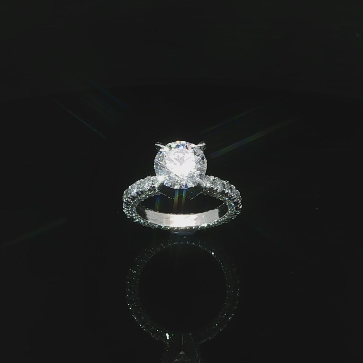 Angled video of 18k white gold eternity engagement ring with 4.75CTW