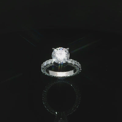Angled video of 18k white gold eternity engagement ring with 4.75CTW