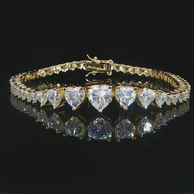 Video of a sterling silver heart-cut moissanite tennis bracelet