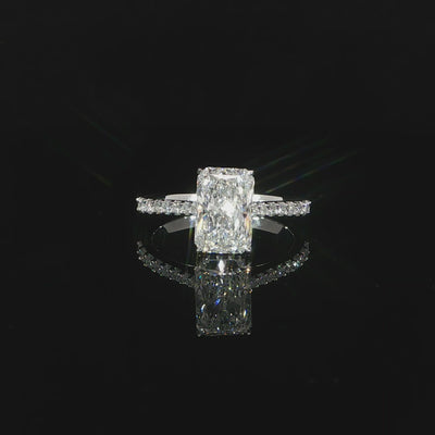 White gold radiant engagement ring featuring 2.53 carats total of lab-grown diamonds.