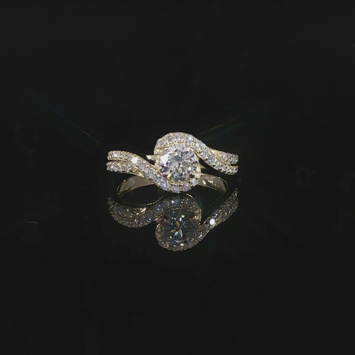 0.97 CTW lab grown diamond ring with a 0.50 carat round center stone in 14K yellow gold.