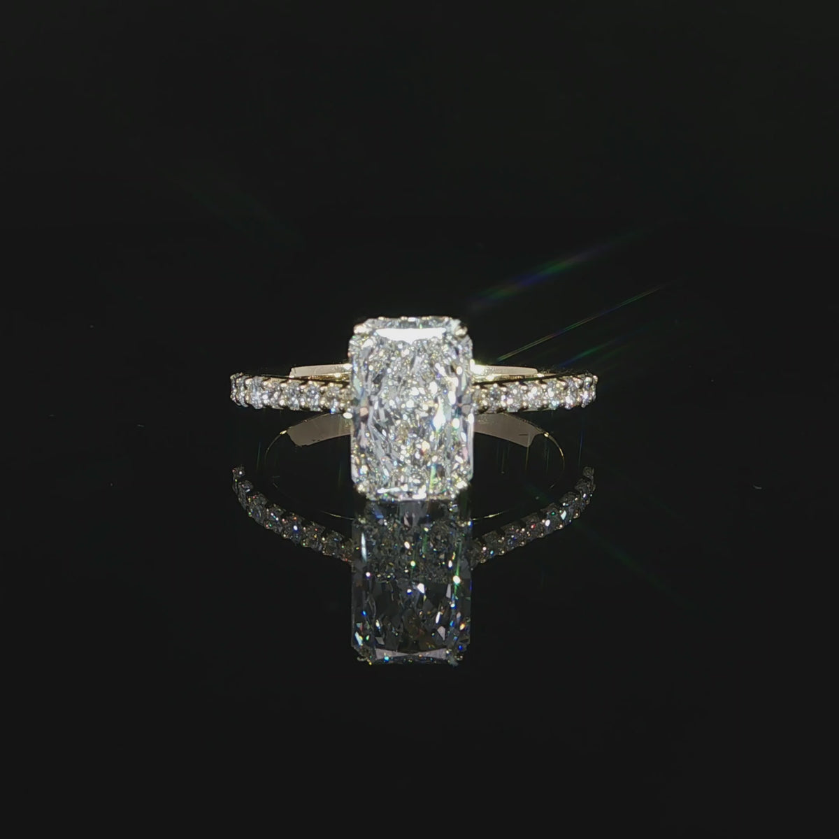 Yellow gold radiant diamond engagement ring with 2.51 carats total diamond weight