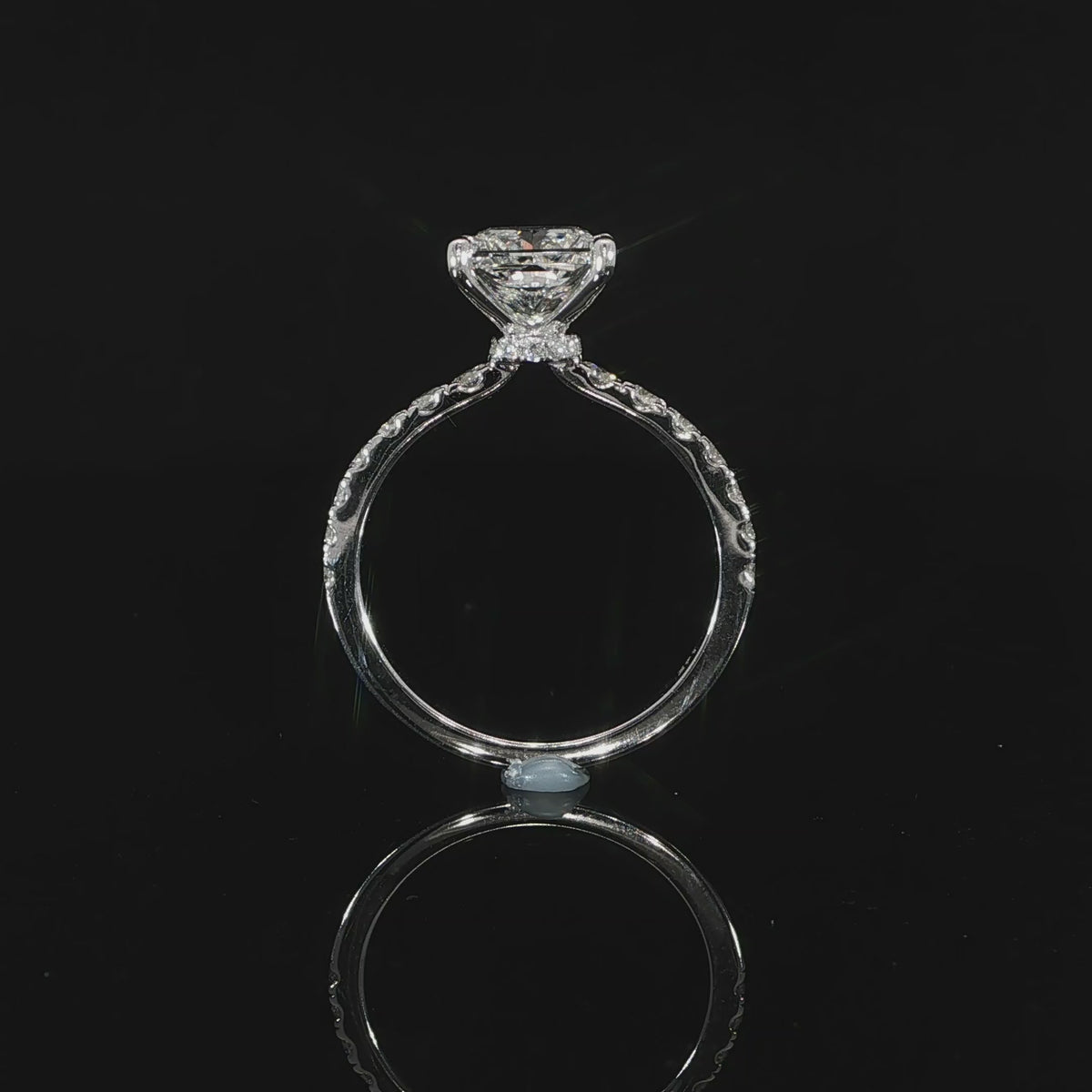 Gallery view of princess cut lab grown diamond engagement ring highlighting the elevated center setting and hidden halo.
