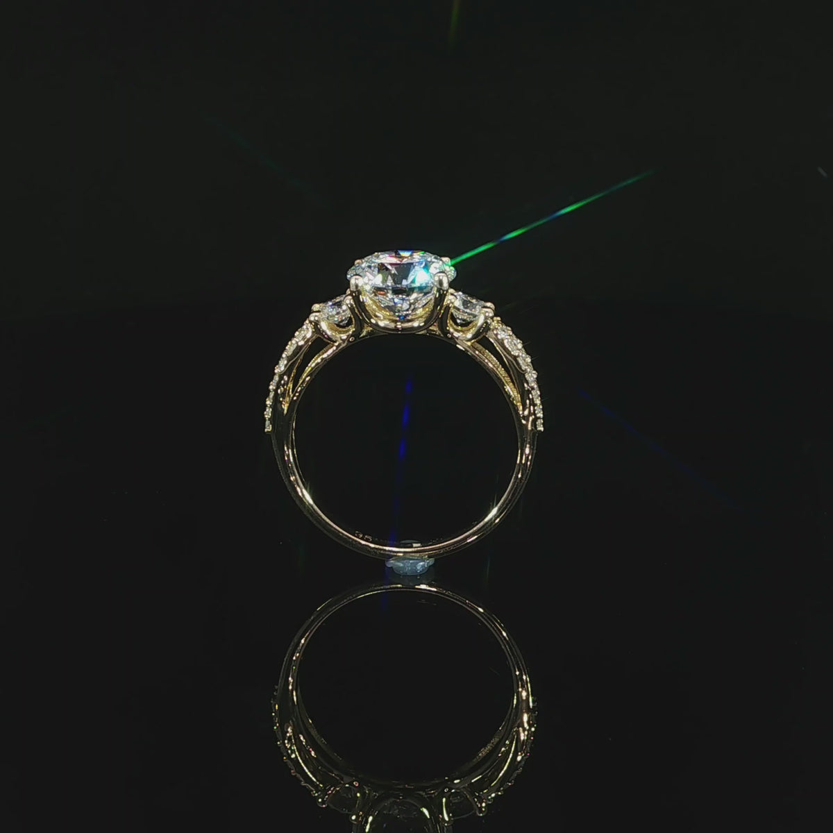 14K gold round lab diamond ring with 2 CT center, side stones, and split shank design