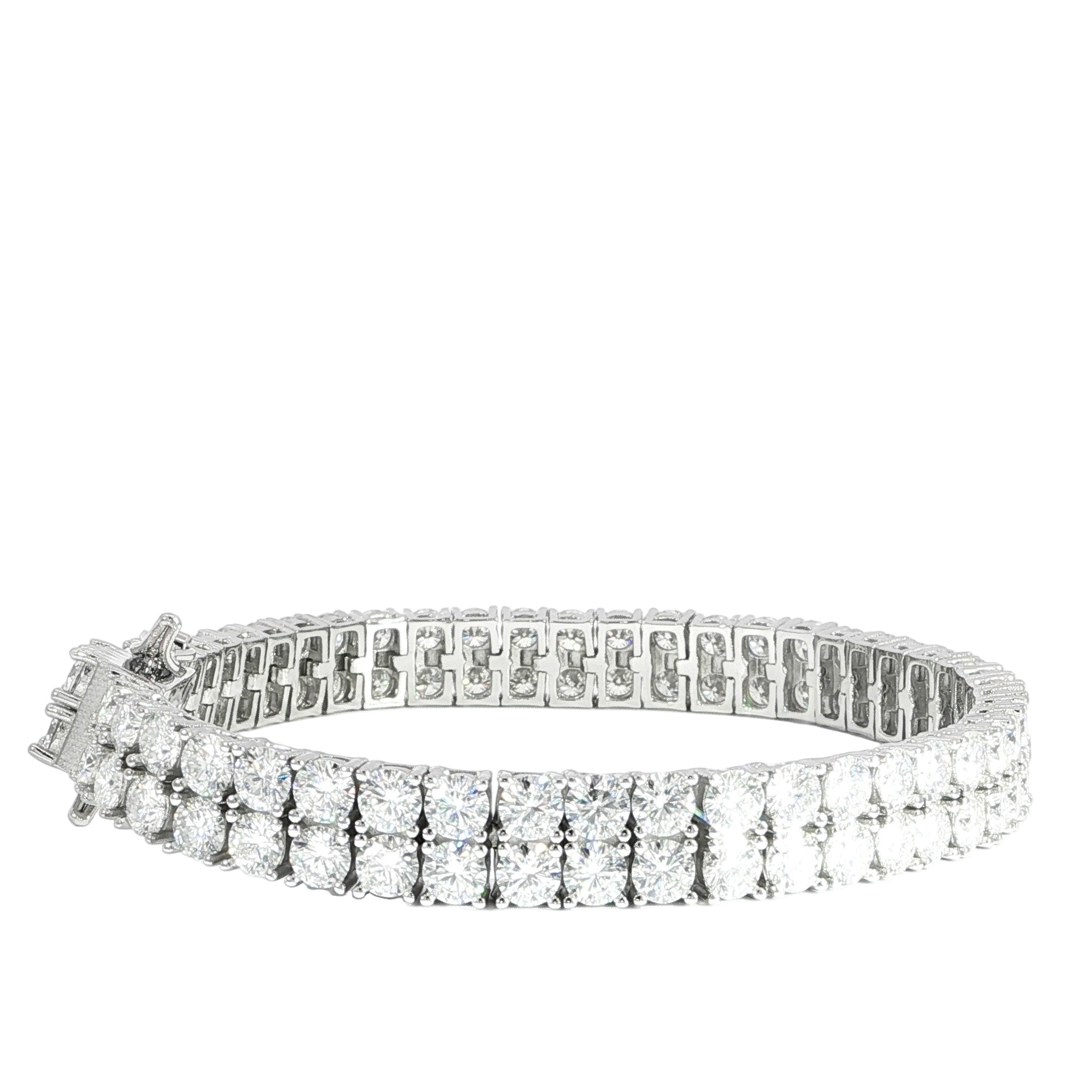 Video iced-out double row tennis bracelet crafted in sterling silver with VVS moissanite